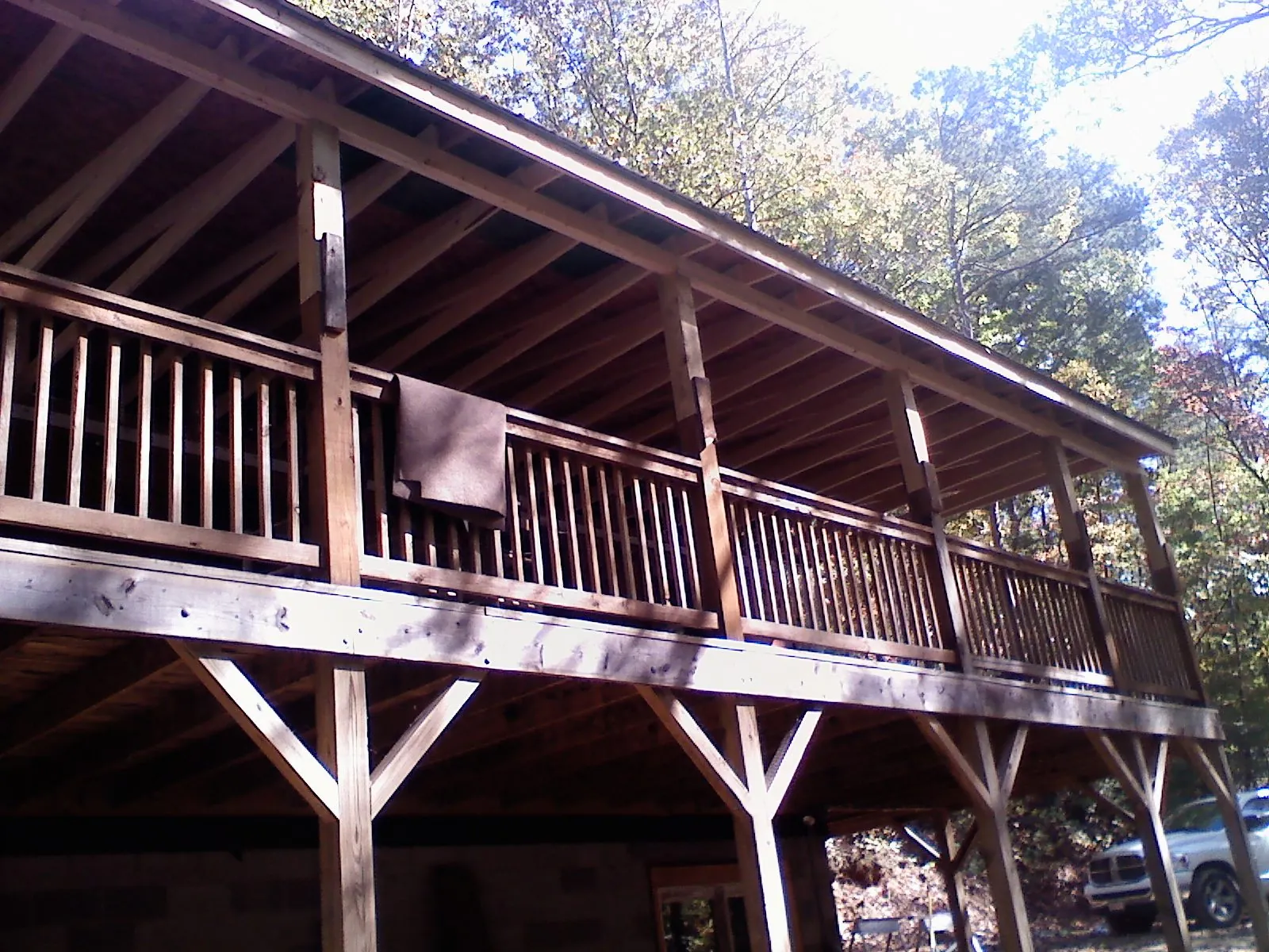 Timber framing under a new elevated porch and deck — Roof Leak Repair in Henry by Roofing Brothers